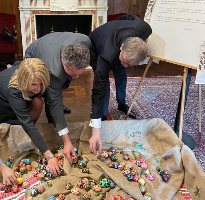 President of the UIA Kathy Nalywajko, Permanent Representative of Ukraine to the UN Sergiy Kyslytsya and Permanent Representative of Lithuania to the UN Rytis Paulauskas adding their pysanky to the installation